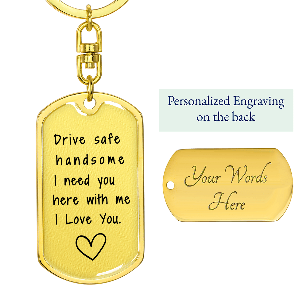 Close-up of 14K Gold overly, engraved message on military dog tag keychain, reading 'Drive Safe Handsome, I Need You Here with Me, I Love You' with a heart outline